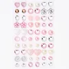 Boucles d’oreilles autocollantes tons de rose Claire's Club - Lot de 30