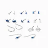 Boucles d’oreilles aux designs variés avec strass couleur bleu saphir - Lot de 9