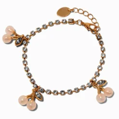 Bracelet à breloques cerises nacrées avec chaîne de strass couleur dorée