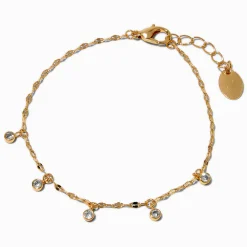 Bracelet avec breloques confetti délicates en zircon cubique couleur dorée