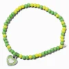 Bracelet élastique en perles de rocaille cœur vert et jaune Claire's Club