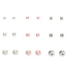 Clous d’oreille de différentes tailles avec perles d'imitation couleur argenté - Lot de 9