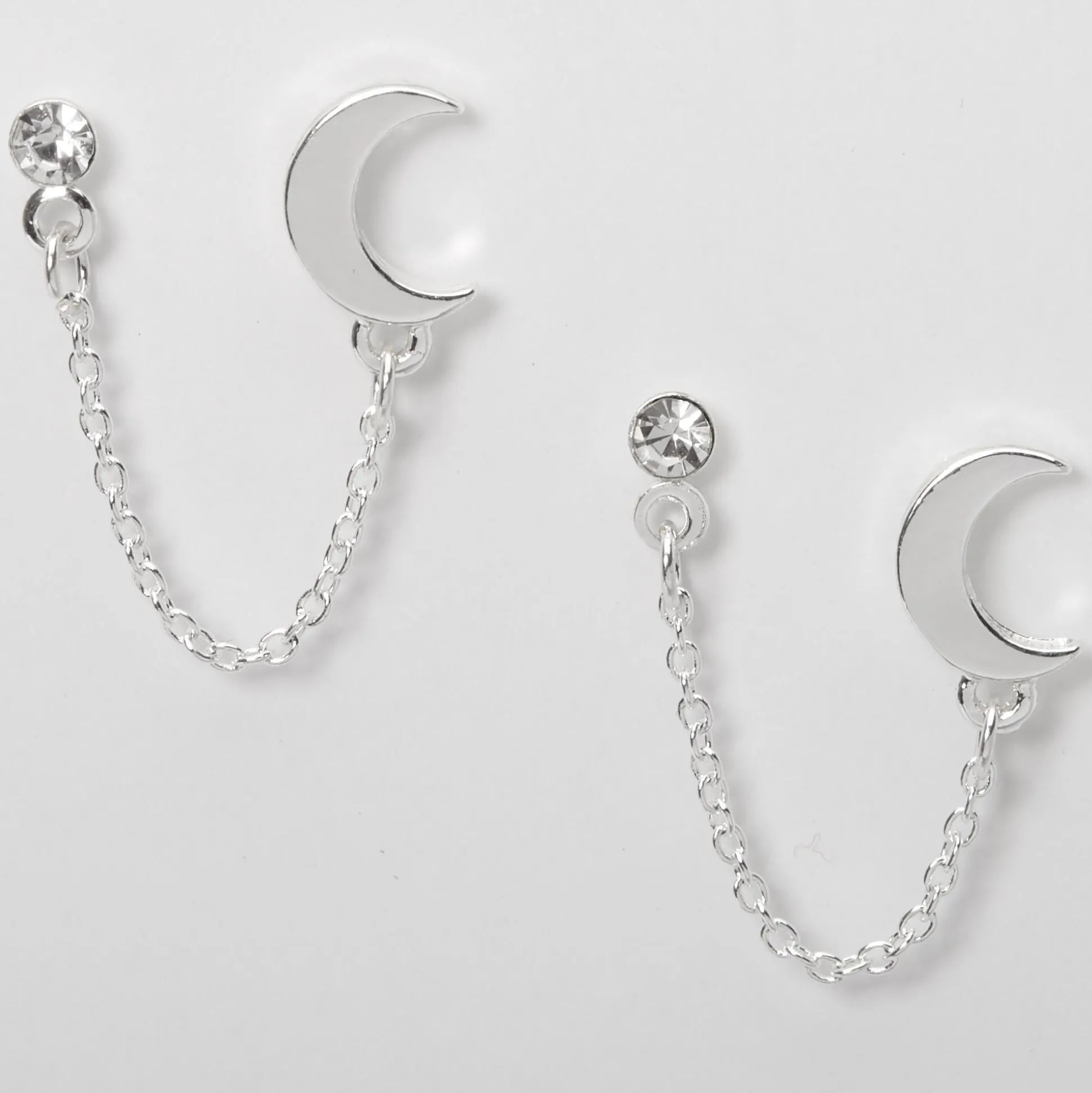 Clous d'oreilles à chaîne lune ornementée couleur argentée