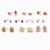 Clous d'oreilles friandises cinéma - Lot de 10