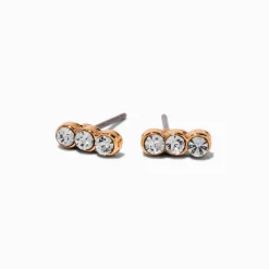 Clous d'oreilles triple strass couleur dorée