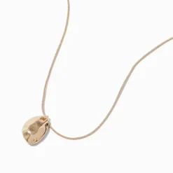 Collier à pendentif galet couleur dorée