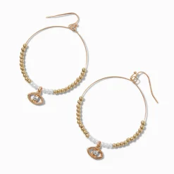 Créoles mauvais œil perlées couleur dorée