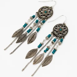 Pendantes perlées 5 cm avec des turquoises d'imitation attrape-rêve couleur argentée